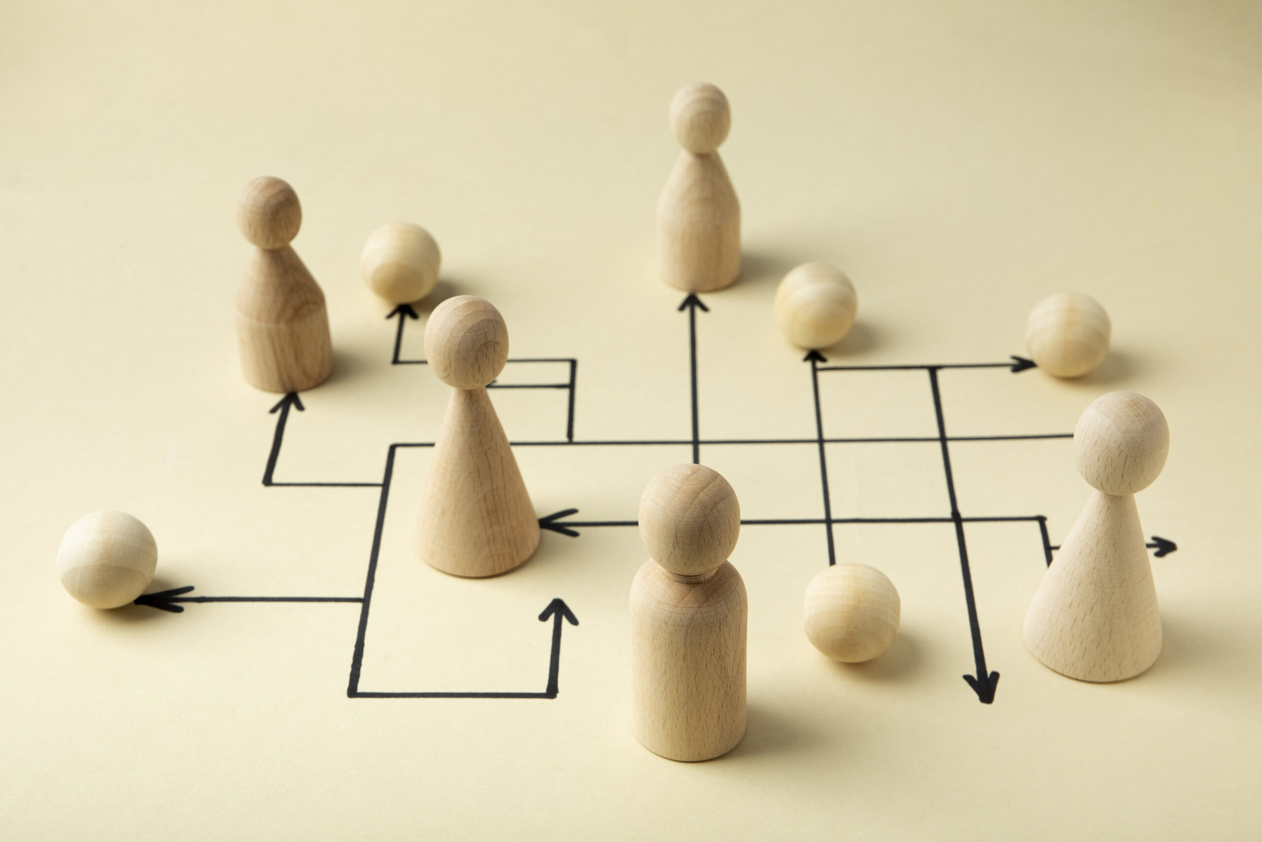 high-angle-wooden-pawns-arrangement